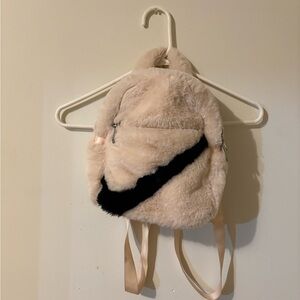 Nike Cream and Black Fluffy Backpack